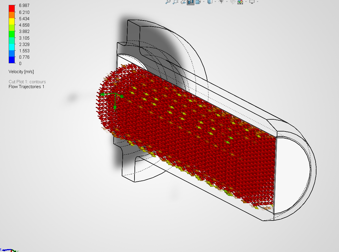Flow trajectories colored by velocity magnitude through the isolated coolant passage at 0.189 kg/s